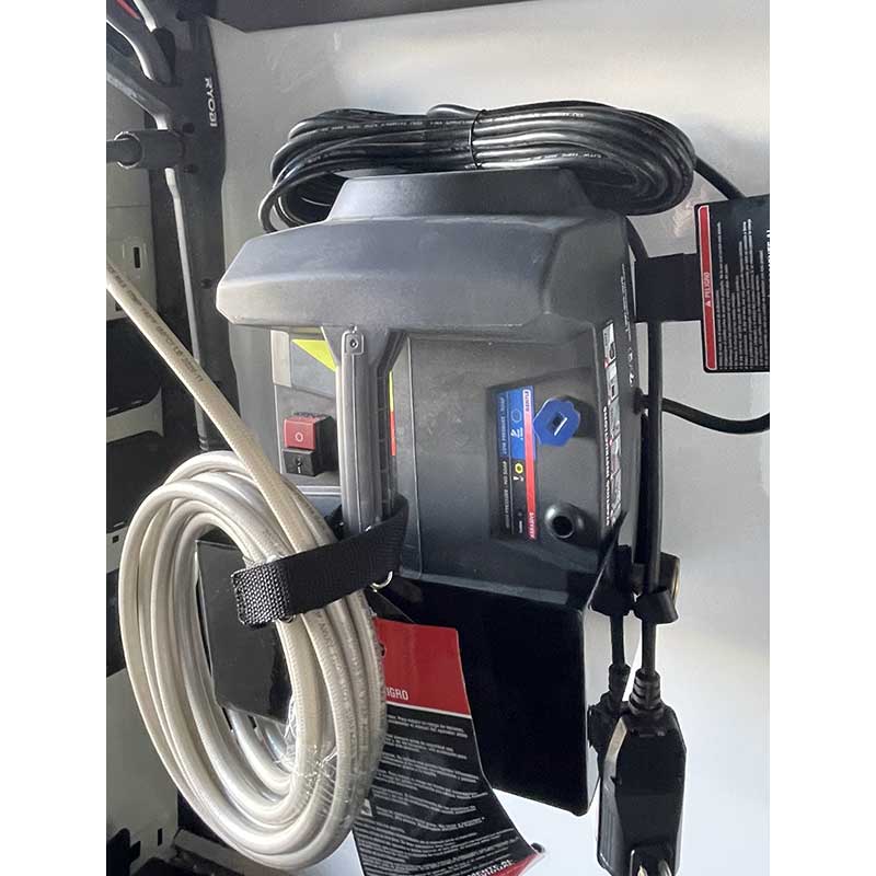 Wall mounted pressure washers